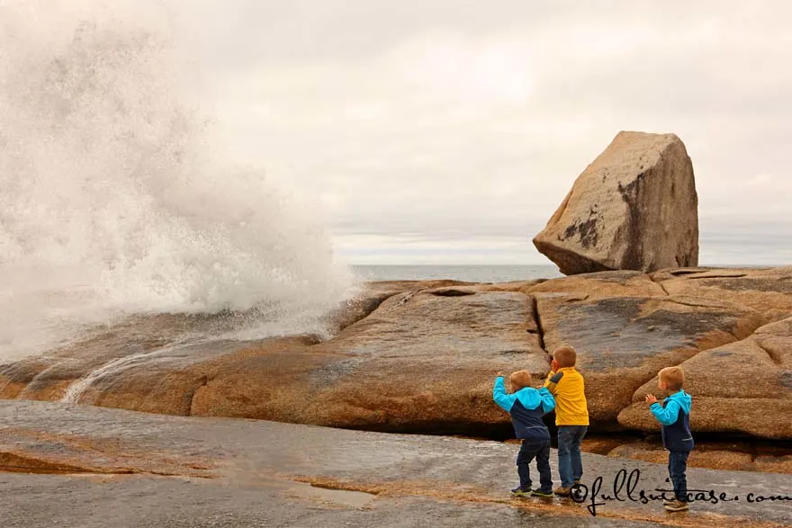 Kids Watching Bicheno Blowhole in Tasmania