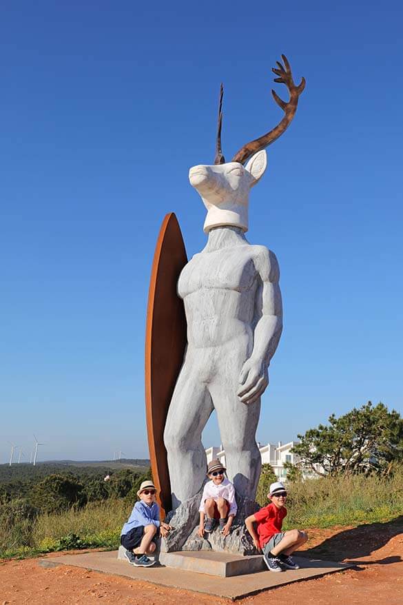 An unusual surfer statue near Nazare lighthouse