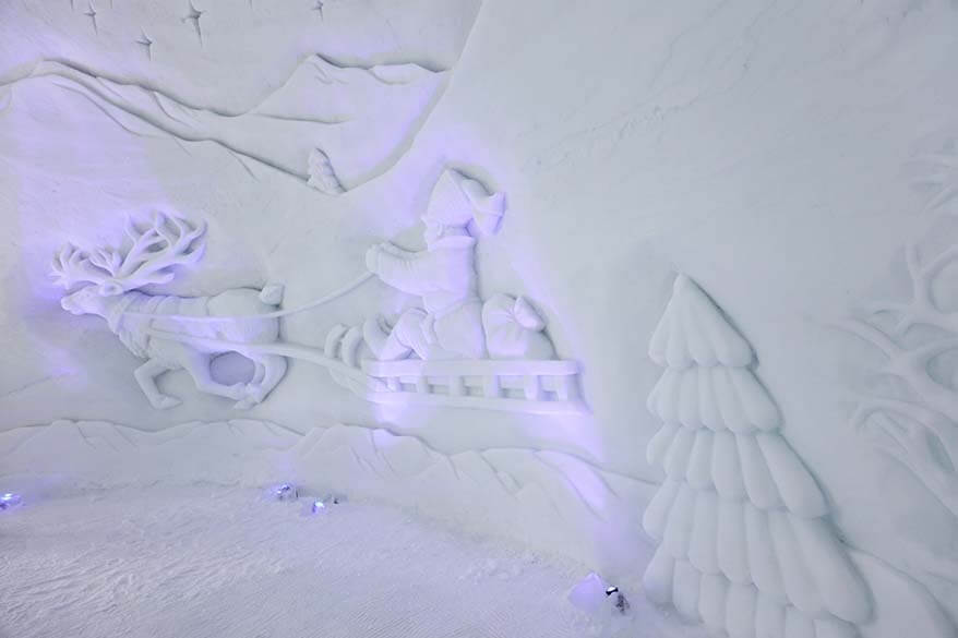 Sami on the reindeer sled ice carving - this image is probably the predecessor of Santa Claus