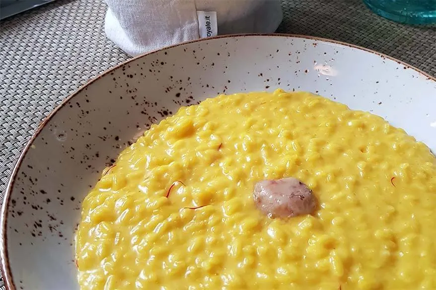 Risotto alla Milanese con midollo - typical dish in Lombardia region in Italy