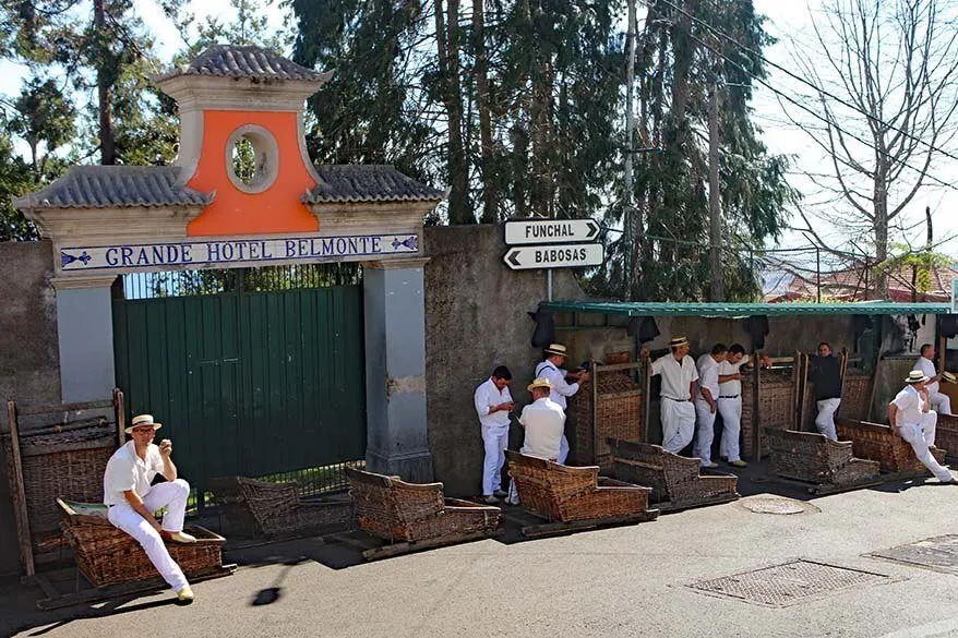 Wicker toboggan sled drivers waiting for tourists in Monte, Funchal Madeira