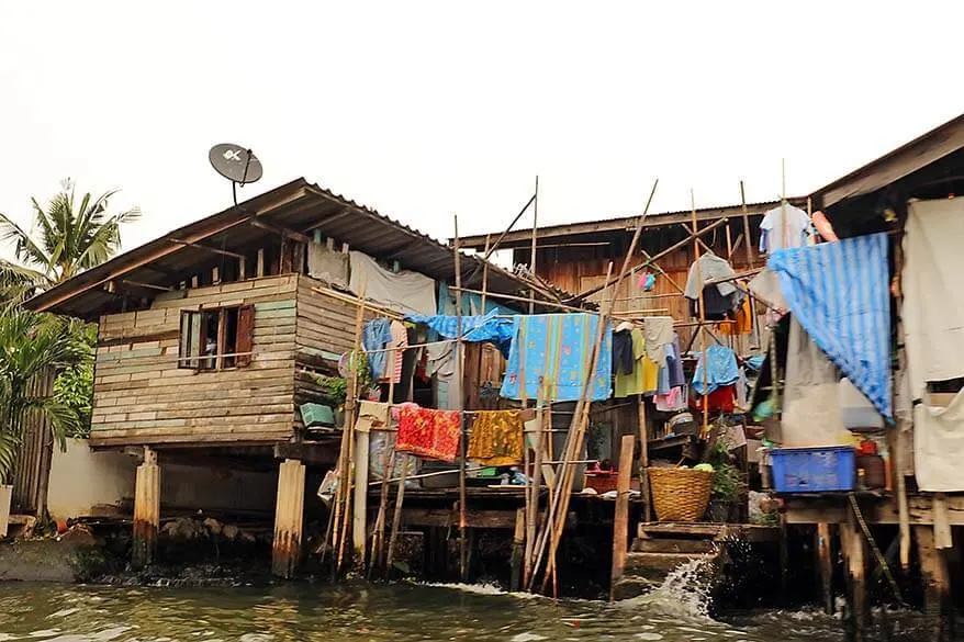 Wooden house built on pillars on the water along Bangkok's canals