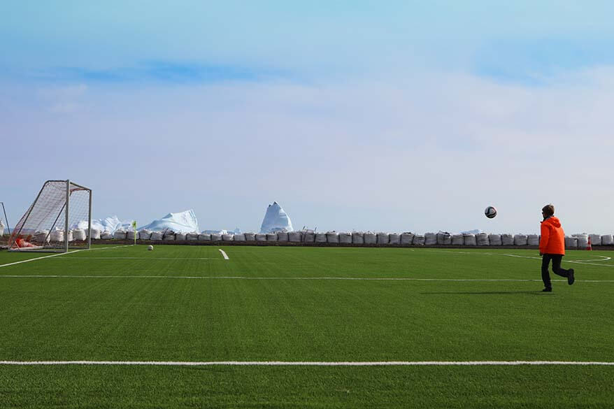 Greenland with kids - playing football near the icebergs on Disko Island