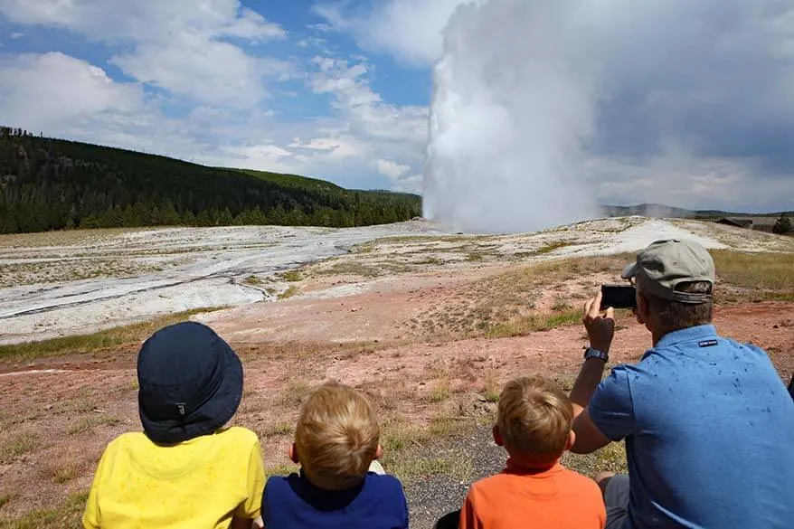 Watching the Old Faithful eruption from the viewing area