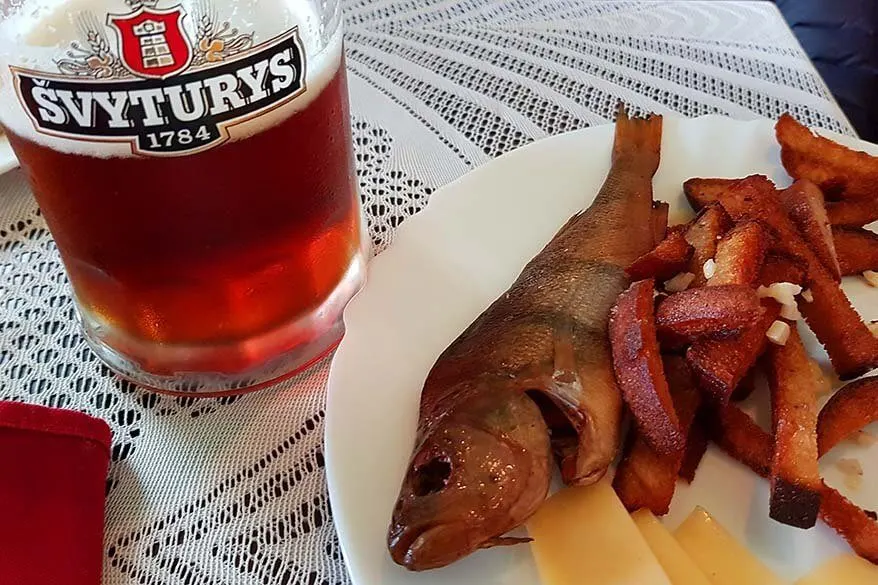 Smoked fish, cheese, and Lithuanian garlic bread at a local restaurant in Preila on the Curonian Spit