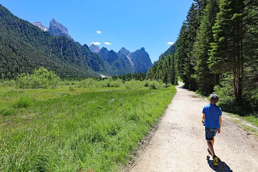 Hiking near Lago di Dobbiaco in summer