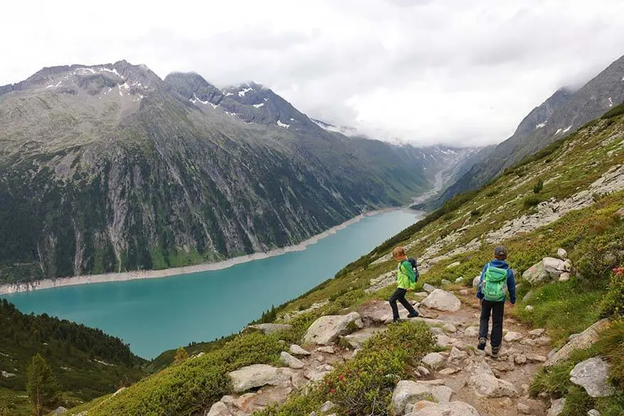 Kids hiking down from Olperer Hut to Schlegeis lake.