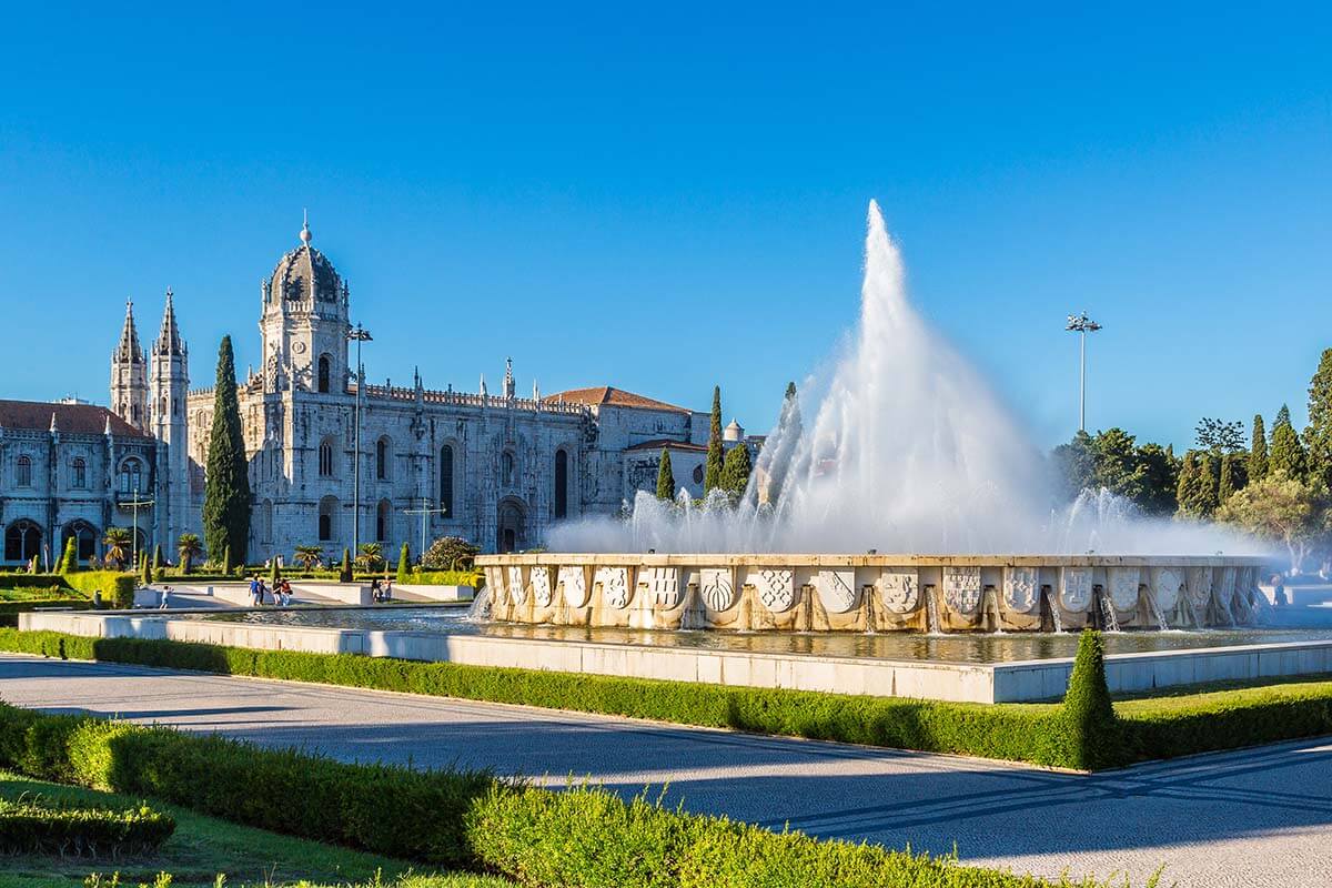 Jeronimos Monastery as seen from Praca do Imperio Gardens with a fountain