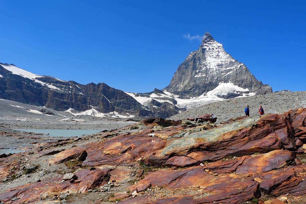 Colorful rocks and glacial lake along the Matterhorn Glacier Trail hike in Zermatt