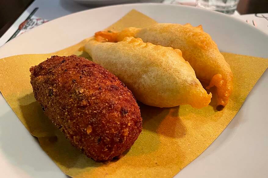 Traditional Roman food - suppli and fried zucchini flowers