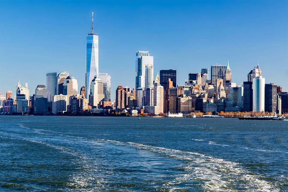 Manhattan skyline as seen from Statue of Liberty cruise NYC