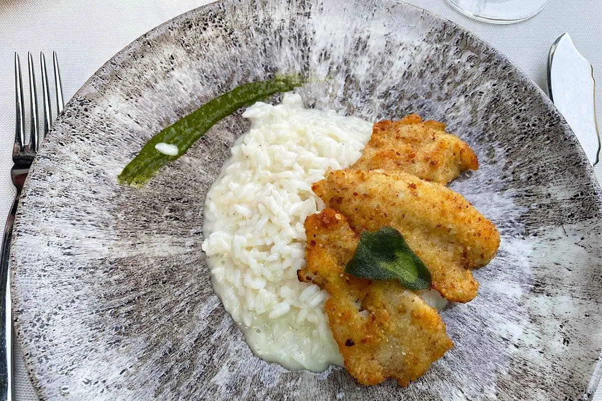 Risotto with perch - traditional dish of Lake Como, Italy