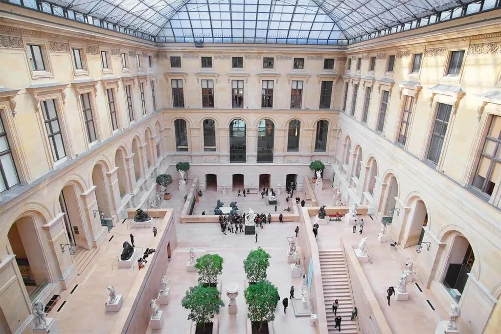 Cour Marly (room 102) sculpture hall under the glass pyramid of the Louvre Museum