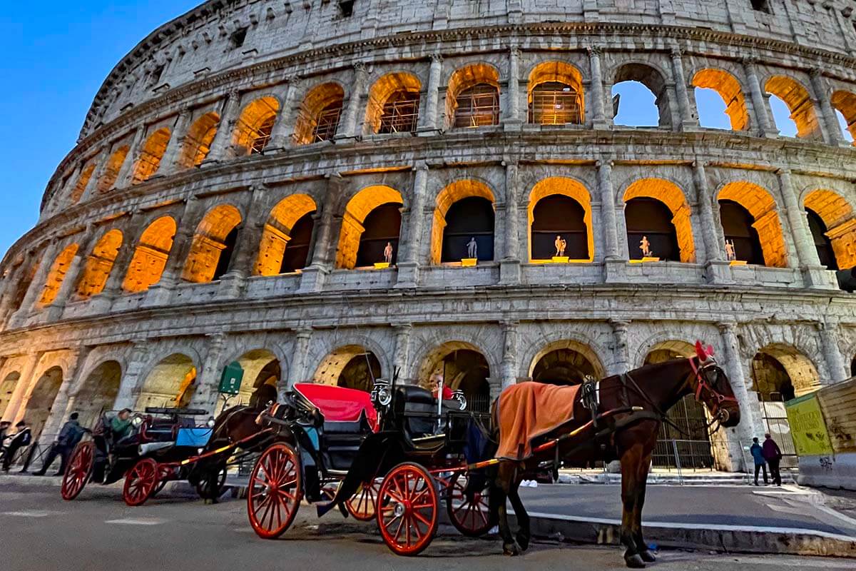 Horse-drawn carriage at the Colosseum in Rome Italy