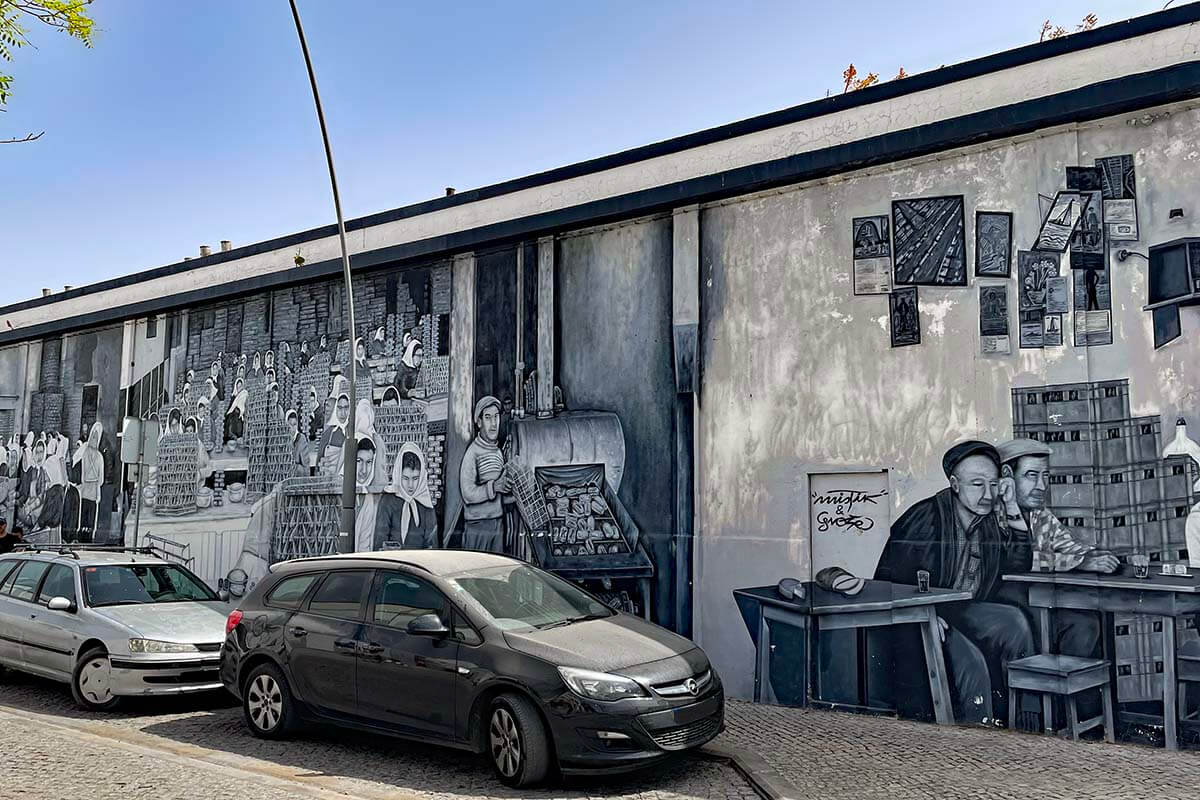 Olhao, Portugal - street art on the walls of an old fish canning factory