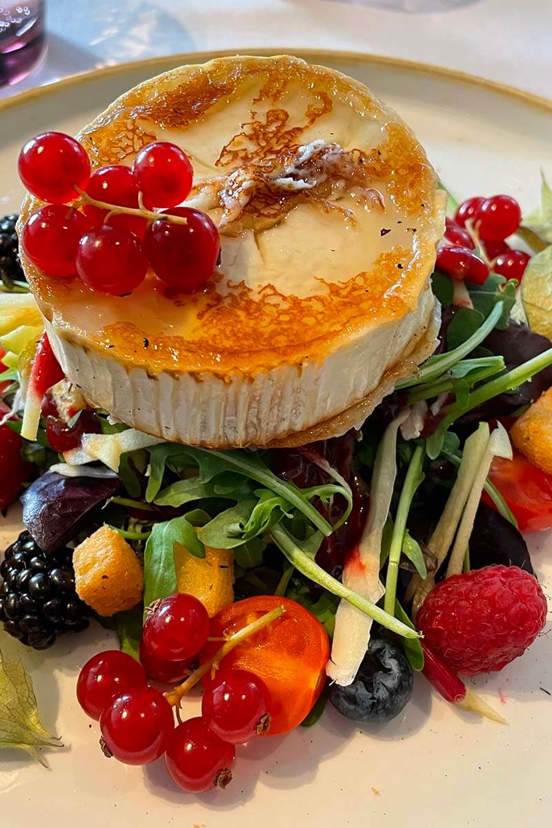 Goat cheese and fruit salad at a restaurant in Antwerp Belgium