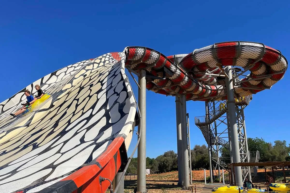 Kids on a water slide at Aqualand water park in Algarve Portugal