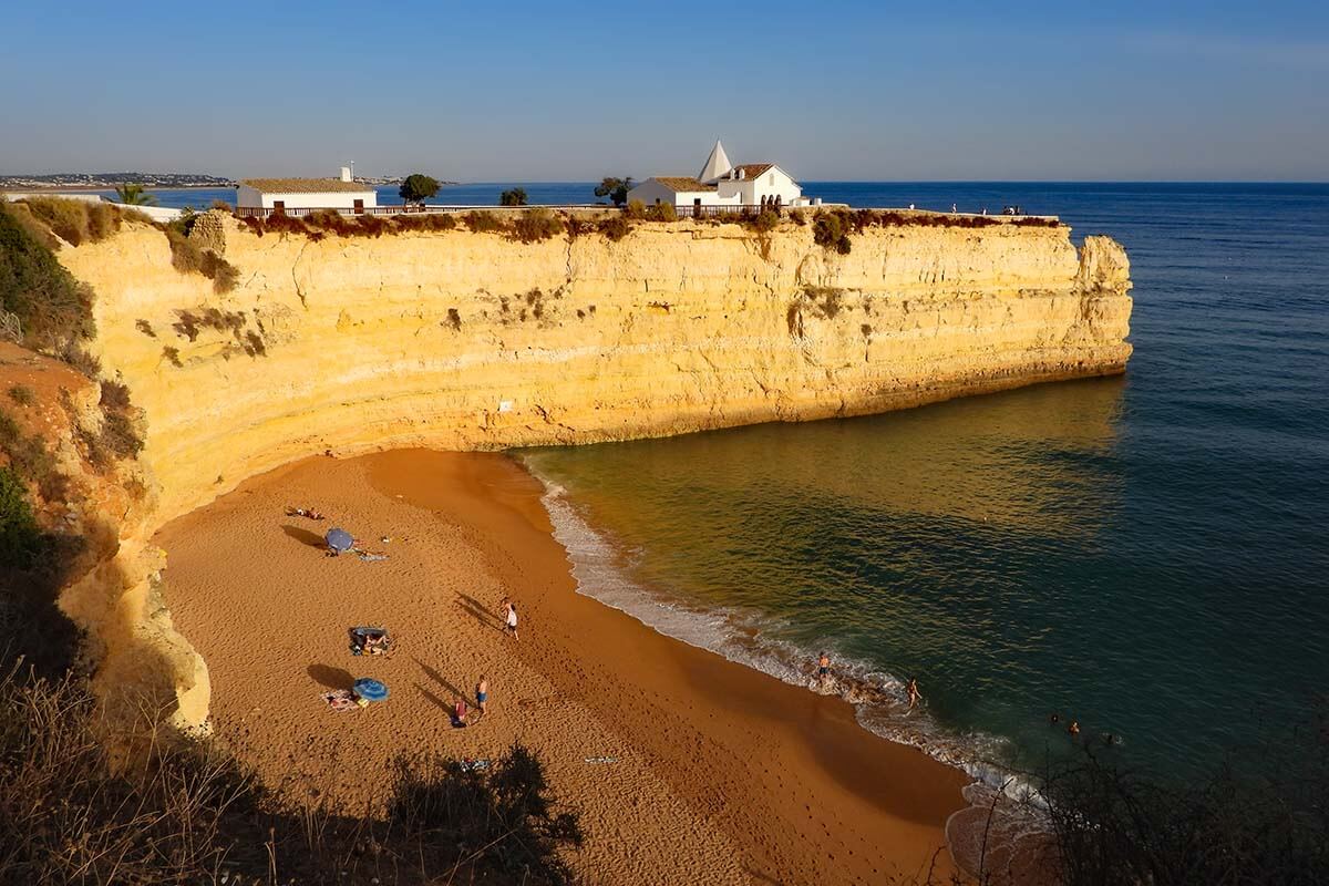 Nossa Senhora da Rocha Chapel and coastline in Algarve Portugal